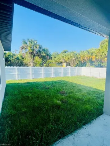 View of fenced backyard