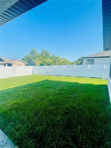 View of fenced backyard