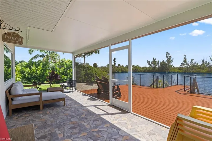 Expansive screened-in porch and open-air deck create the perfect outdoor oasis.