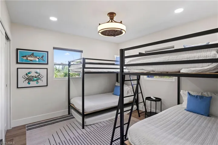 The guest bedroom is a fun and functional space, perfect for kids, guests, or a vacation rental setup.