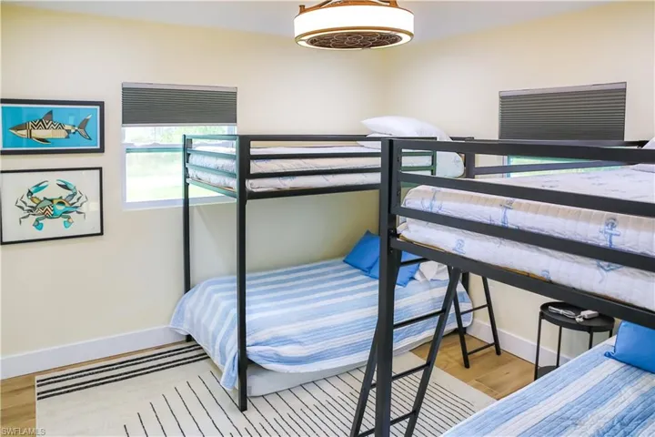 The guest bedroom is a fun and functional space, perfect for kids, guests, or a vacation rental setup.