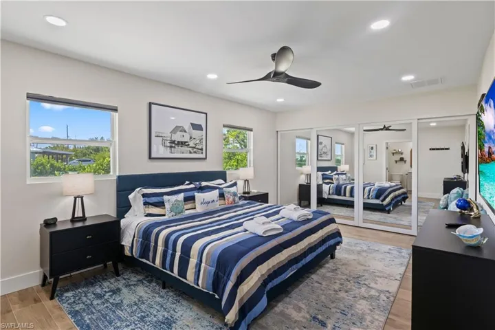 The primary bedroom is a peaceful retreat designed for comfort and relaxation.