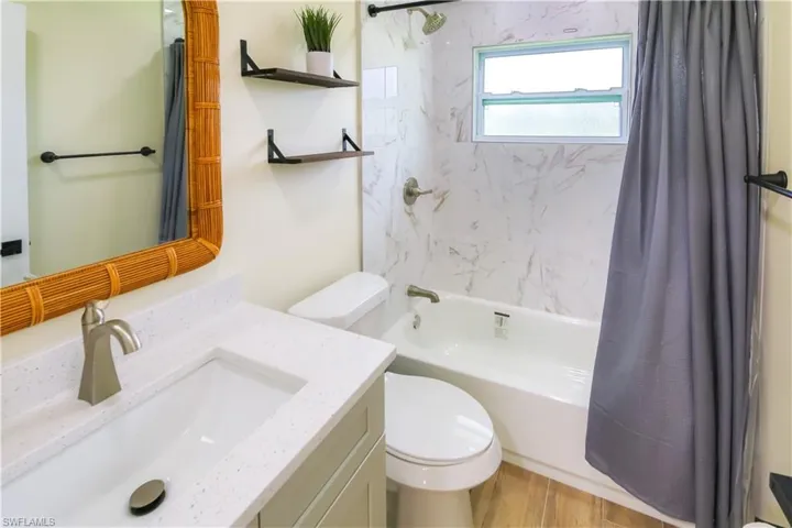 Full-size shower/tub combination, this bathroom is perfect for accommodating family and guests.