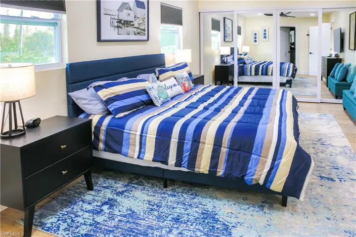 The room features a large layout with plenty of space for a king-size bed and additional seating.