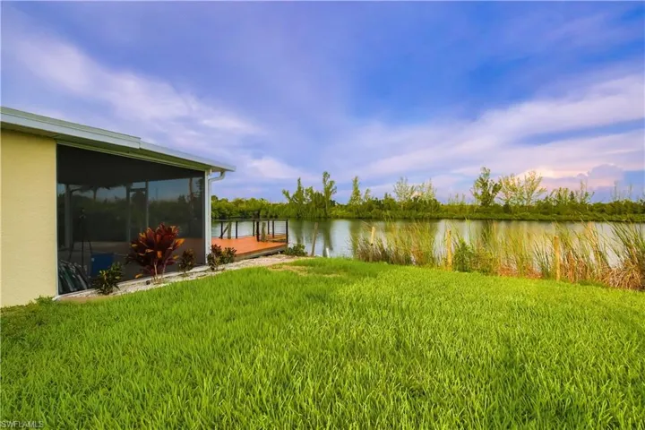 Situated on a spacious half-acre lot, so many possibilities.