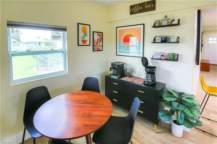 Enjoying a quiet morning coffee, this beautifully designed space enhances the flow and comfort of the home.