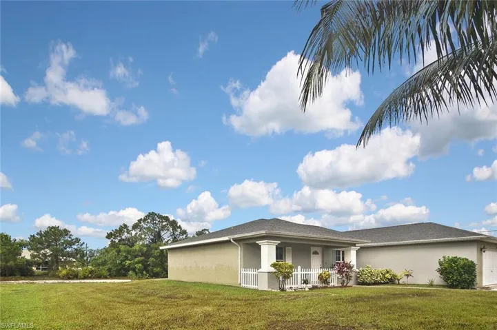 View of front of property with a front yard