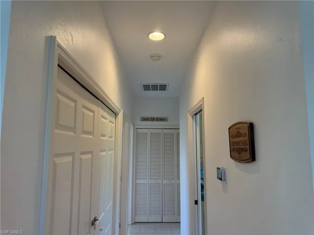 Owners Closet on Left. Half Bath on Right.
