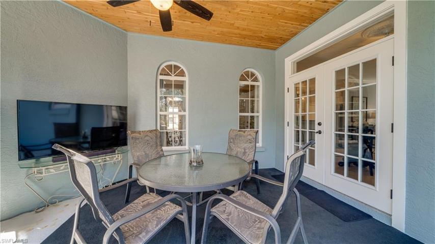 Those lovely French doors are hurricane impact. They "let the sun shine in".