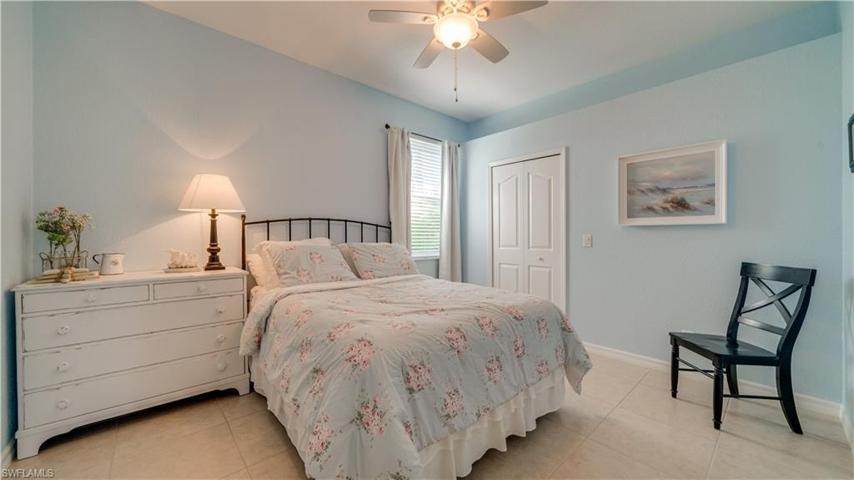 What is behind door number one in this large and lovely guest room? A walk-in closet!