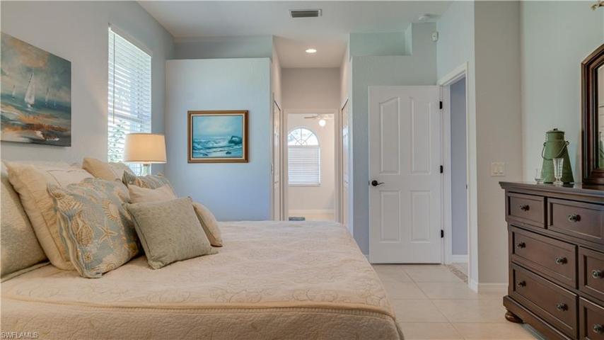 Take note of those two walk-in closets. The calming, fresh paint adds a touch of elegance.