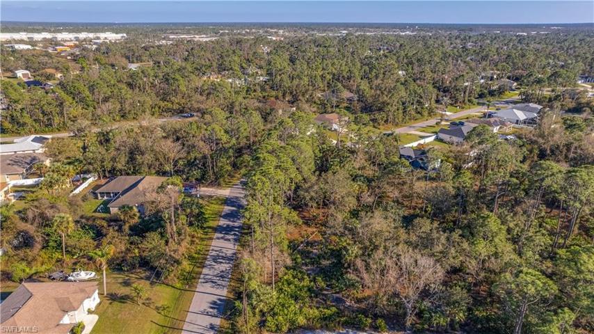 An executive home on 1 lot and; 3 Lots to Spare!