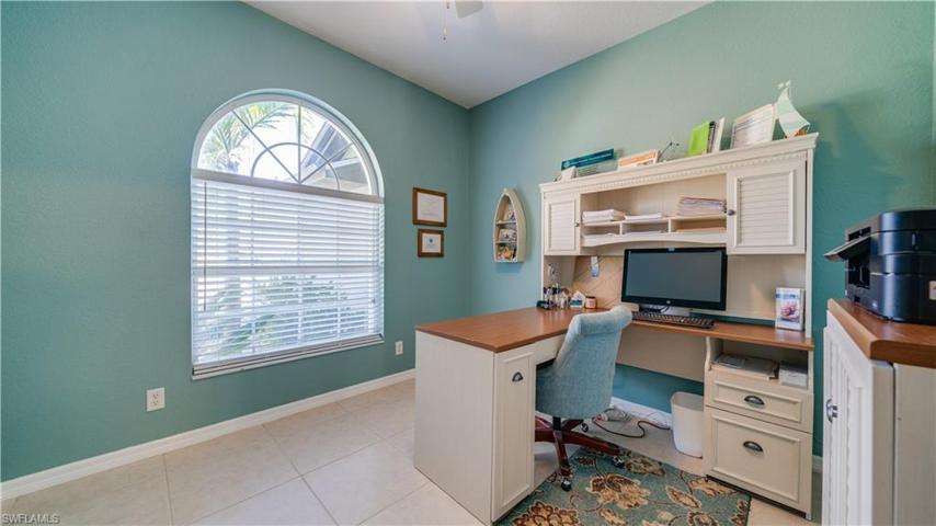 This home office can be "your" office, craft room, or den. You decide.