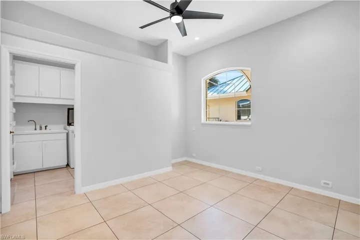 Guest bedroom off laundry room