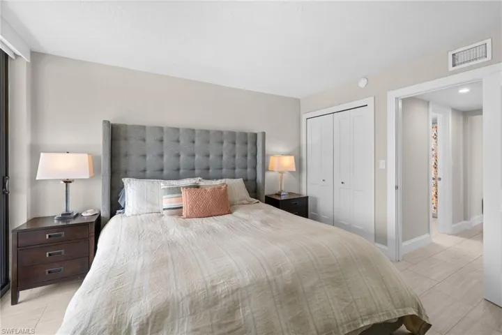 Interior room featuring neutral wall tones, light wood-finish flooring, and white trim