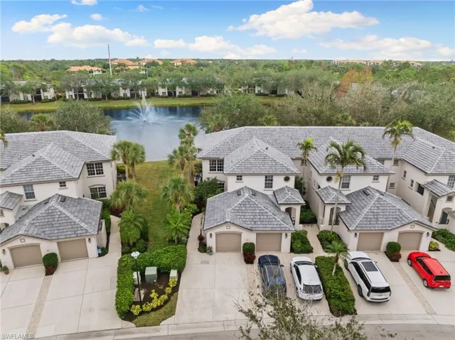 Bird's eye view with a water view and a residential view