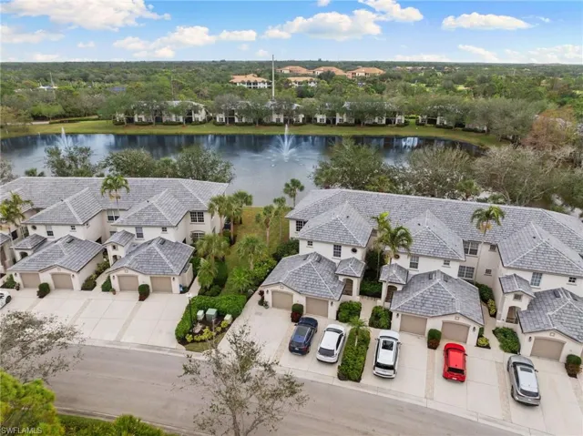Aerial view with a residential view and a water view