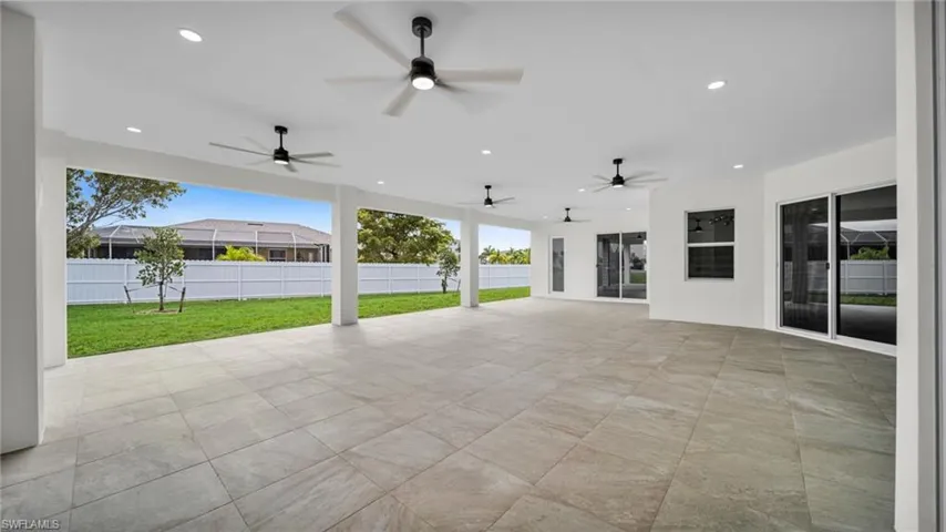 View of patio featuring ceiling fan