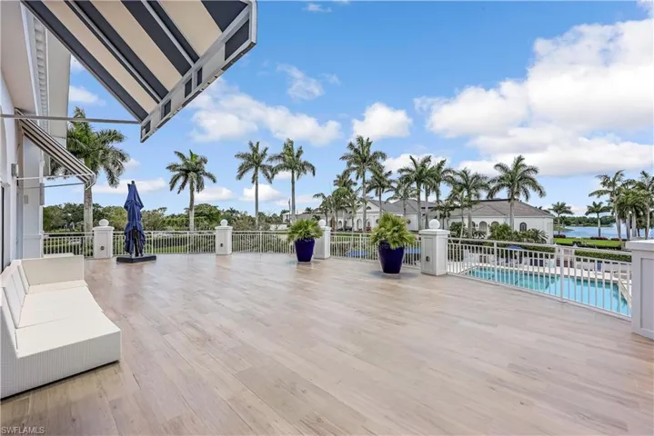 Community pool featuring a patio