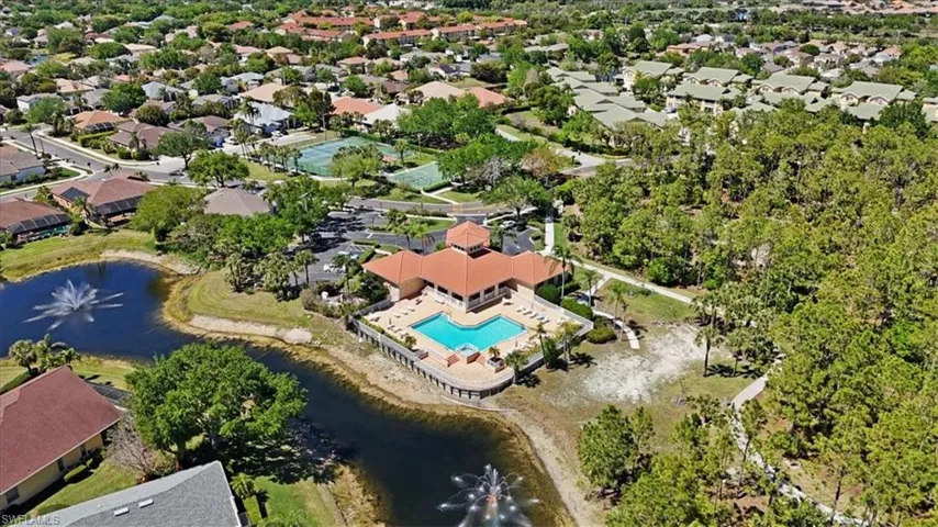 Aerial view featuring a residential view and a water view
