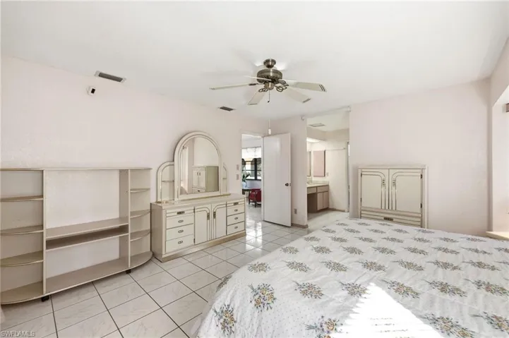 Bedroom featuring ceiling fan and light tile patterned floors