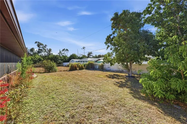 View of fenced backyard