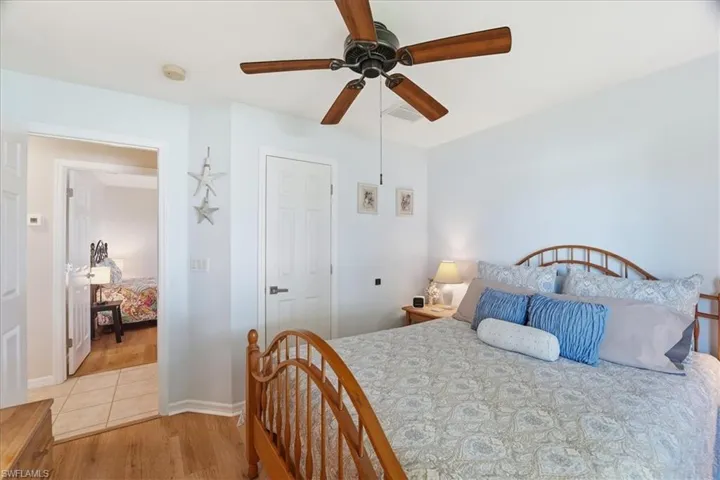 Bedroom featuring light wood finished floors and a ceiling fan
