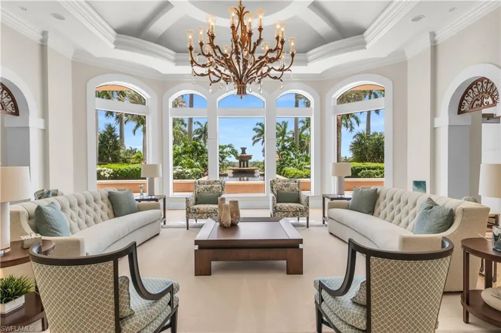 Sunroom with a chandelier and healthy amount of natural light