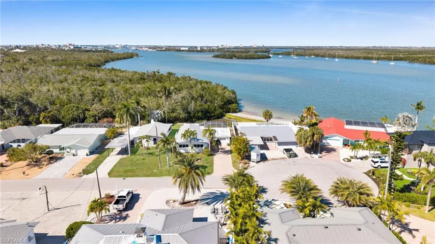 Aerial view of residential area with a large body of water
