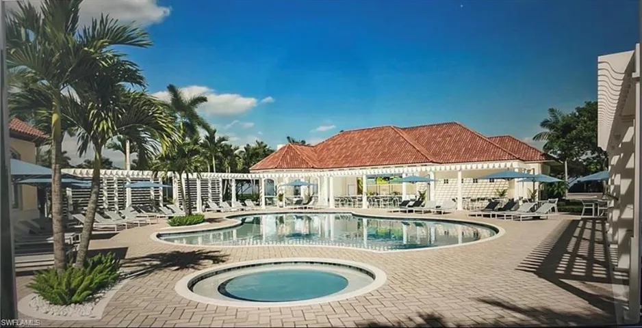 Community pool with a community hot tub and a patio