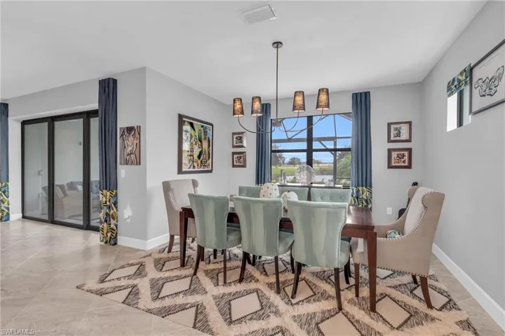 Dining area with a chandelier