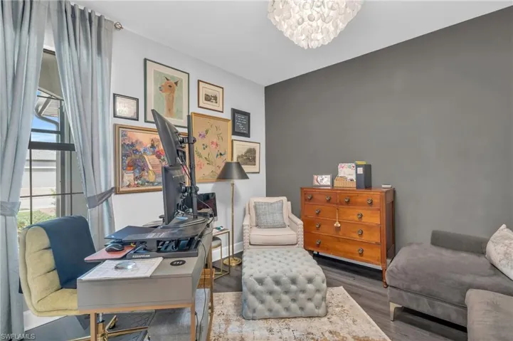 Office area with an inviting chandelier