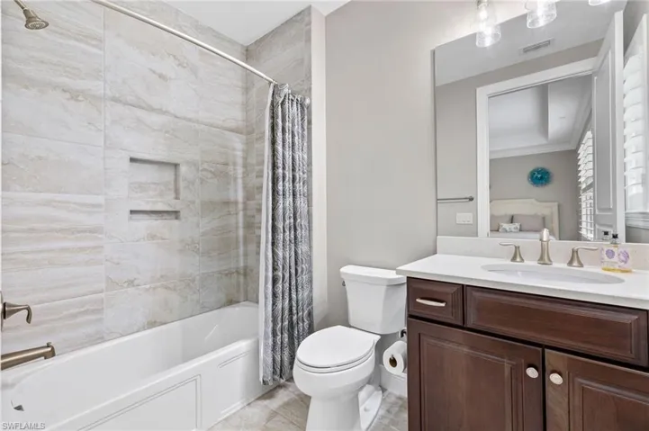 Guest Bathroom 2 featuring shower/bath combo.