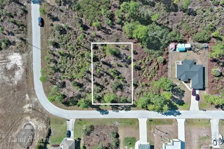 Aerial view of property's location featuring property parcel outlined