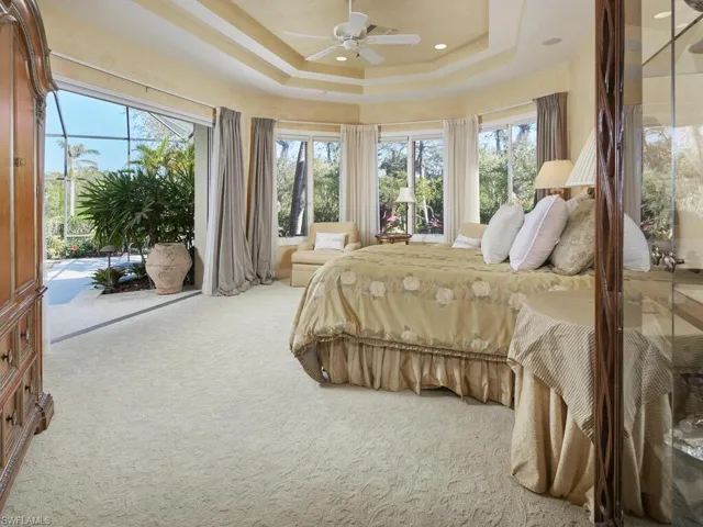 Primary bedroom open to the lanai.