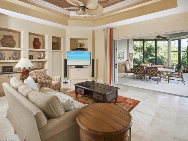 Family room/den open to lanai, kitchen and informal dining space.