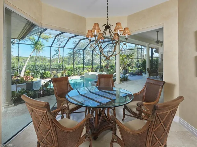 Informal dining area open to den/living and kitchen.