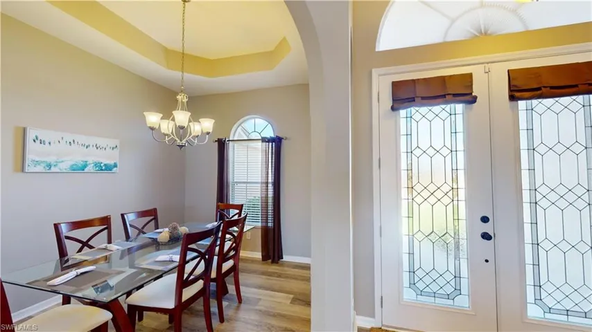 Flexible room currently used as dining area, would also work great as a home office.