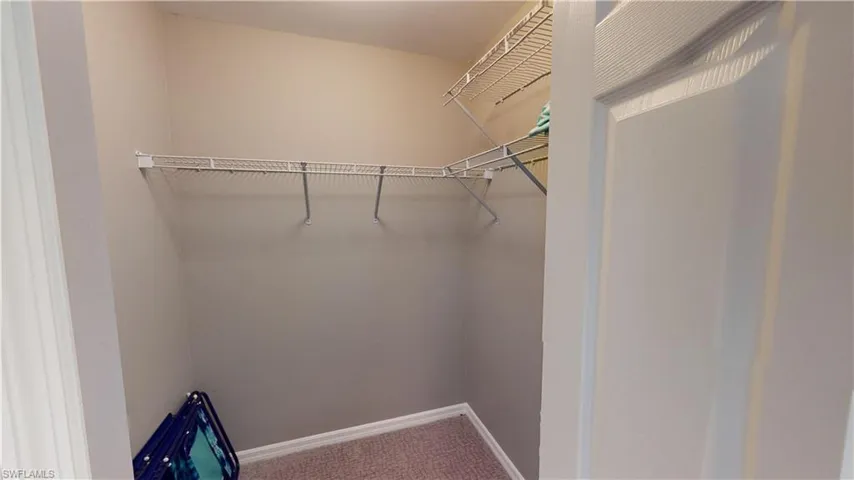 Primary bedroom closet 2