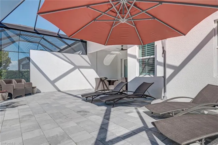 View of patio with a sunroom and a lanai
