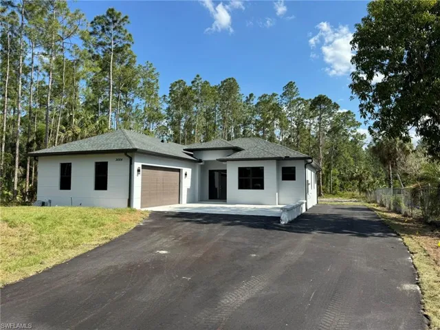 View of front of house with a garage
