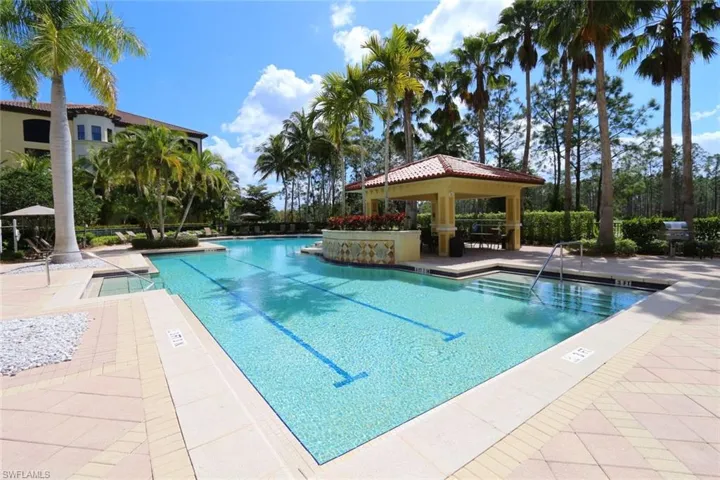 Community pool featuring a gazebo and a patio area
