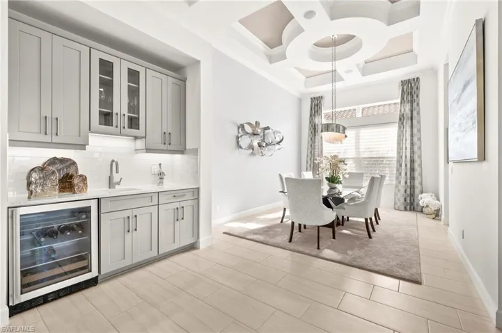 Bar Area with Sink, Beverage Refrigerator & Lighting