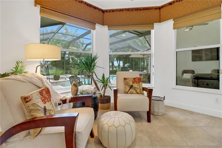 Living area featuring light tile patterned floors