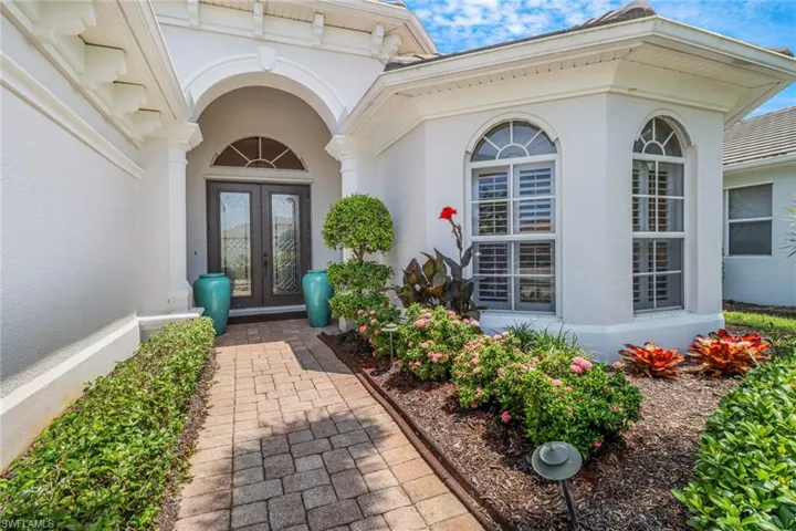 Entrance to property featuring french doors