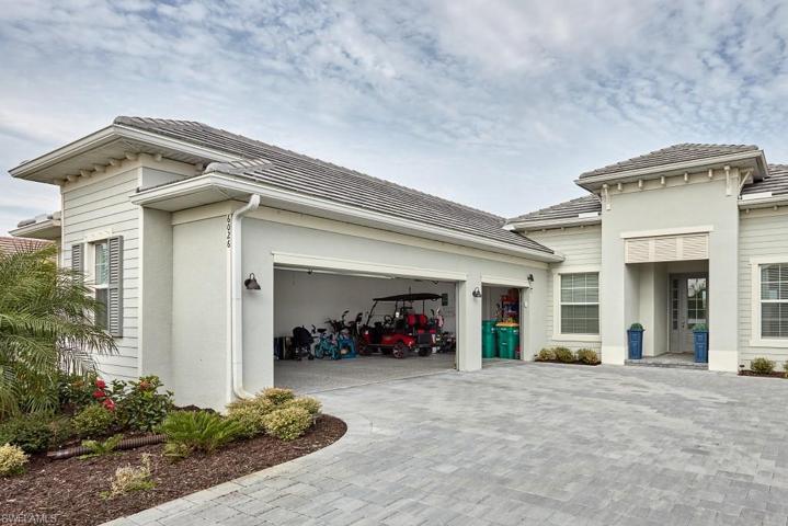 Front of house, Garage open