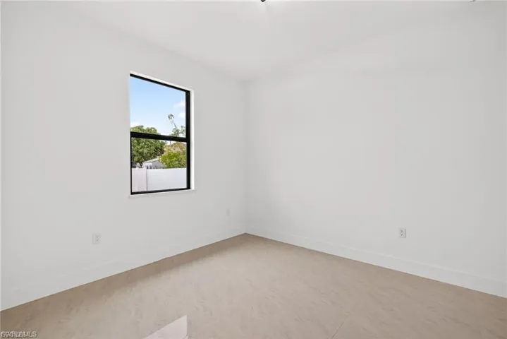 Empty room with baseboards