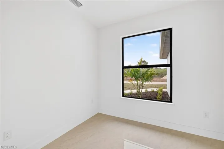 Spare room with baseboards