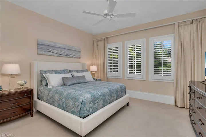 Front guest suite has plantation shutters, walk-in closet, plenty of sunshine, and the perfect place to receive your guests.