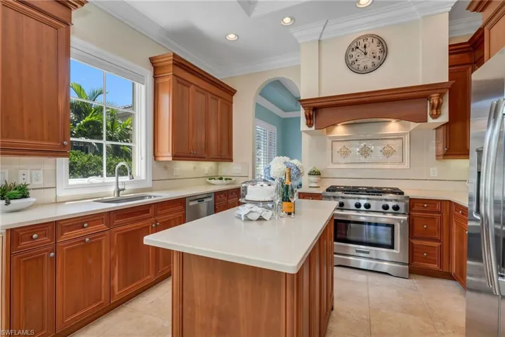 This bright and cheery kitchen has new countertops and abundant storage.